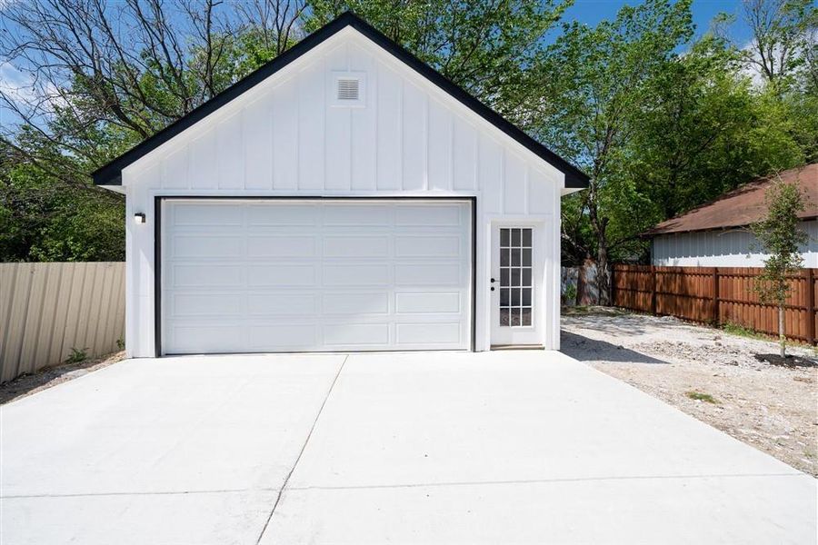 Front exterior of a new home in , Dallas, TX, highlighting curb appeal (Image 22).