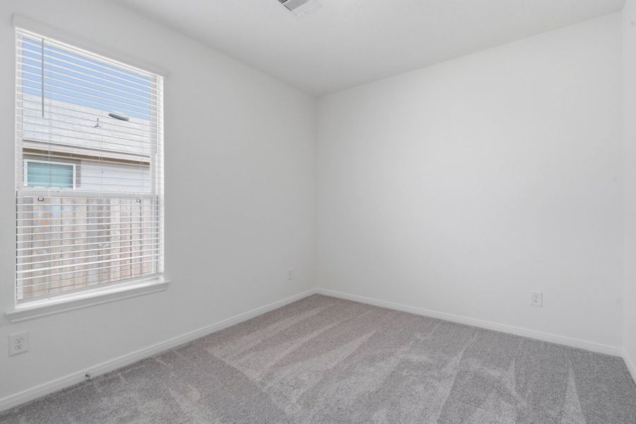 Spacious, unfurnished interior of a new home in Mustang Ridge, Magnolia (Image 20).