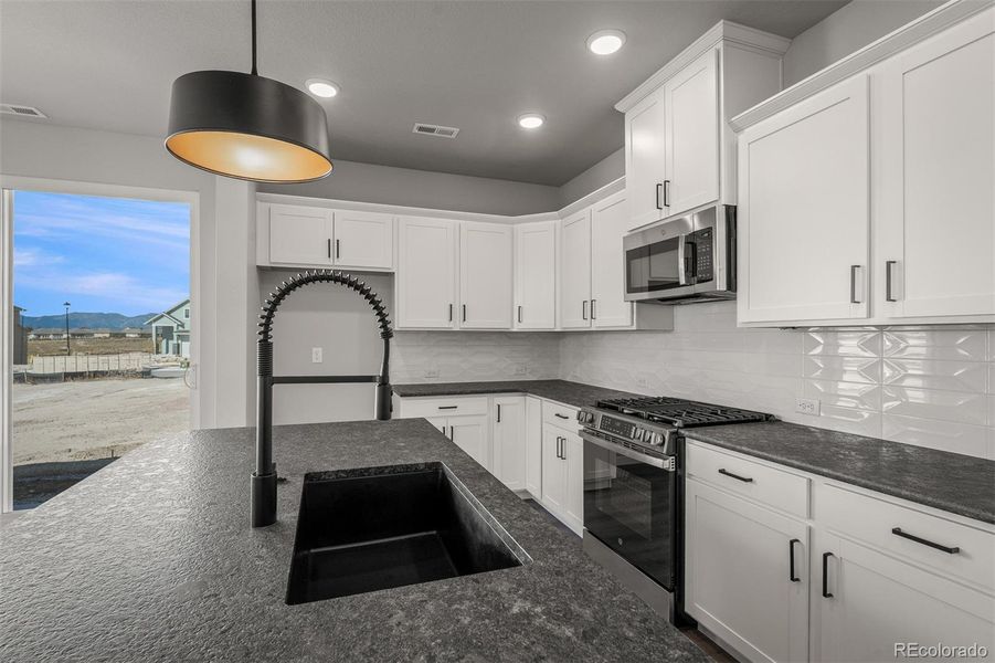 Furnished interior view inside a new home in Revel Crossing at Wolf Ranch – The Ascent Collection, Colorado Springs (Image 5).