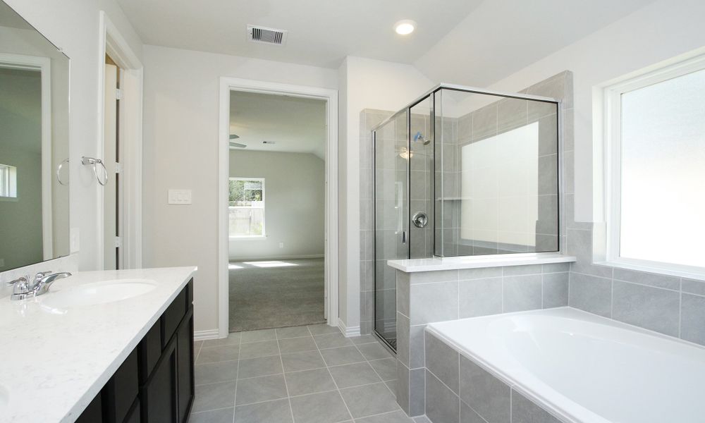 Representative furnished interior of a home built from the Enclave Series - Fiji by DRB Homes in Meyer Ranch – Premier, New Braunfels (Image 18).