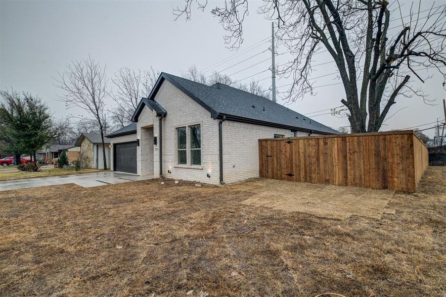 View of home's exterior with a garage