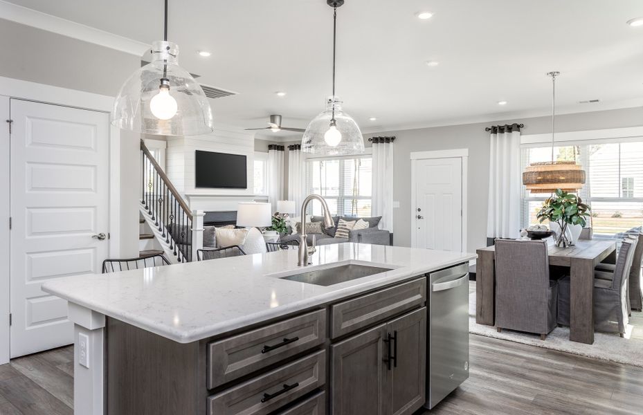 Kitchen Island also provides more storage. Model Home Representation.