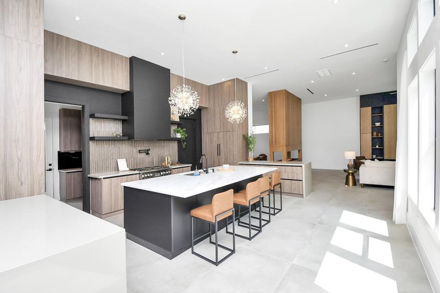 Gourmet open chef kitchen with multiple islands and a second kitchen behind it! Gourmet open chef kitchen with multiple islands and a second kitchen behind it!