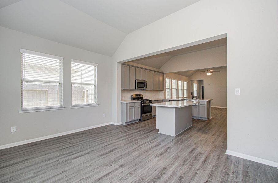This home has been upgraded with additional windows, elevated ceilings, all very aesthetically pleasing