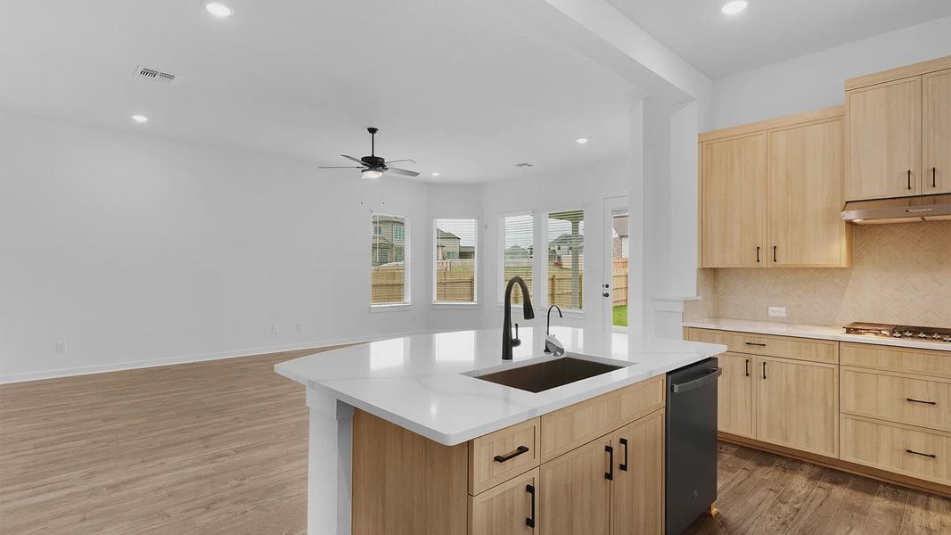 Representative furnished interior of a home built from the Acadia by Chesmar Homes in Crescent Bluff, Georgetown (Image 5).
