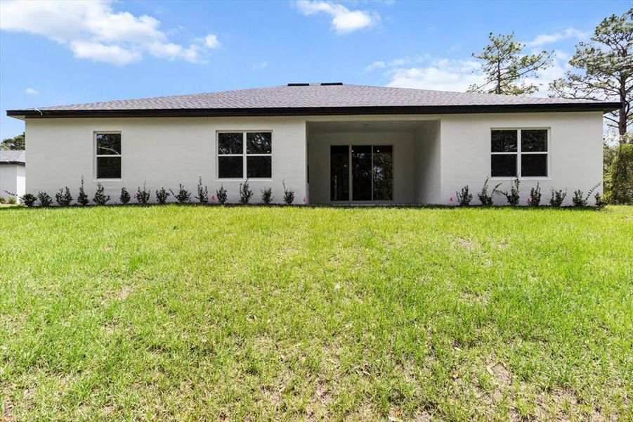 Front exterior of a new home in , Ocala, FL, highlighting curb appeal (Image 22).