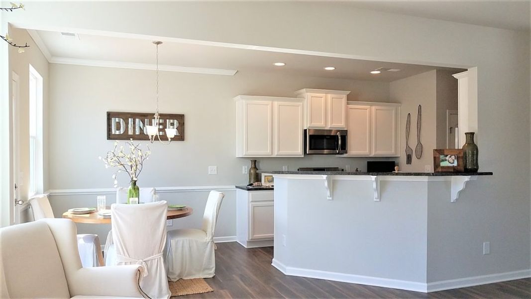 Representative furnished interior of a home built from the Emory by Piedmont Residential in Falls Creek, Flowery Branch (Image 3).
