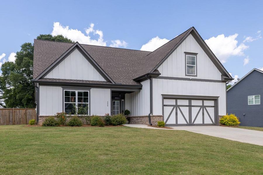 Front exterior of a new home in , Winder, GA, highlighting curb appeal (Image 2).