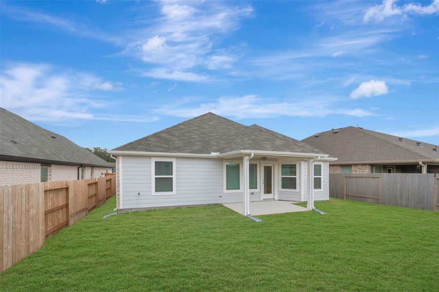 Exterior details and patio area of a home in Magnolia Ridge, Magnolia (Image 3). Exterior details and patio area of a home in Magnolia Ridge, Magnolia (Image 3).