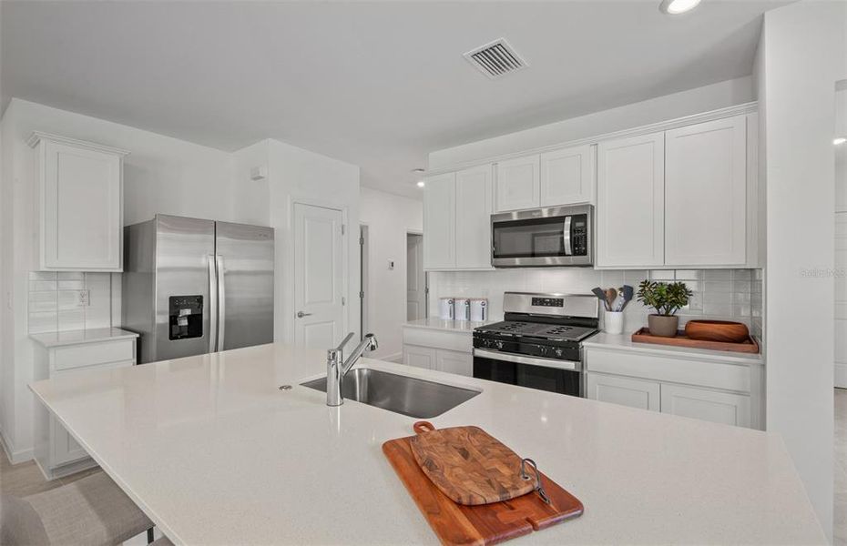 Furnished interior view inside a new home in Reagan Landing, Bradenton (Image 9).