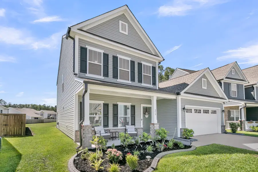 Front exterior of a new home in , Summerville, SC, highlighting curb appeal (Image 2). Front exterior of a new home in , Summerville, SC, highlighting curb appeal (Image 2).
