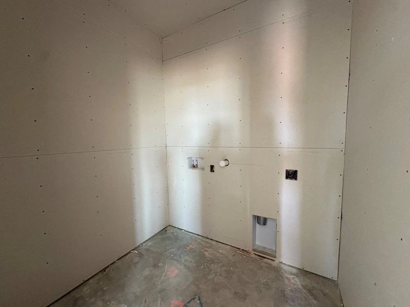 In-progress construction of a new home in Rolling Glen, Hutto, TX (Image 15).