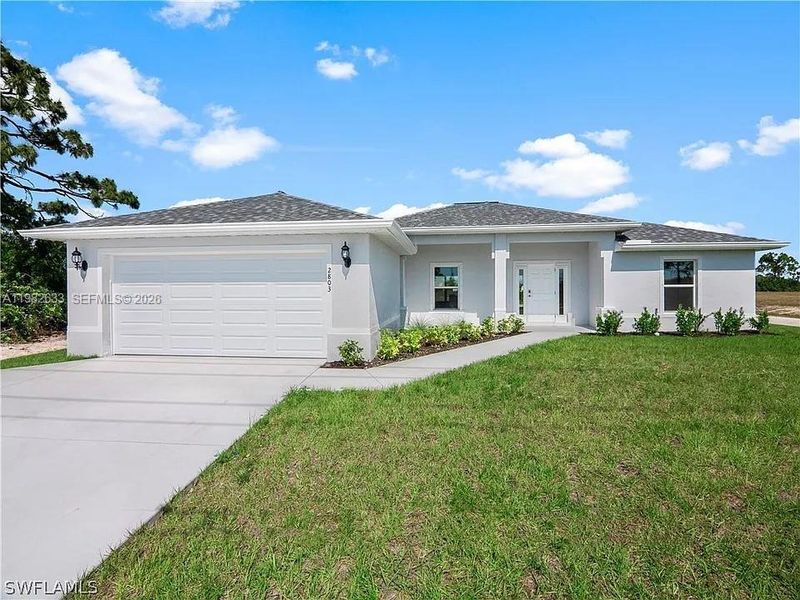 Front exterior of a new home in , Cape Coral, FL, highlighting curb appeal (Image 1). Front exterior of a new home in , Cape Coral, FL, highlighting curb appeal (Image 1).
