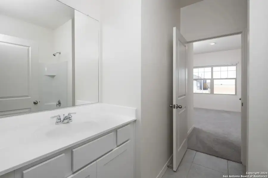 Furnished interior view inside a new home in Hennersby Hollow, San Antonio (Image 7).