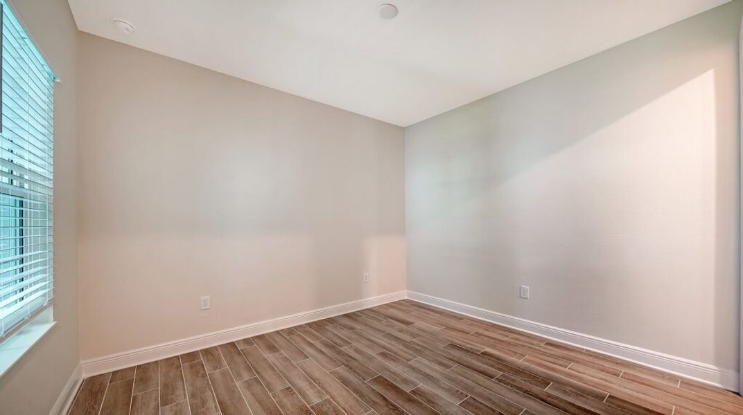 Spacious, unfurnished interior of a new home in Windward Real Estate and Homes for Sale in Sarasota, FL - Neal Communities, Lakewood Ranch (Image 30).