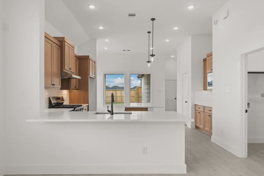 Representative furnished interior of a home built from the Pinehurst by Chesmar Homes in Riceland Alley Loads, Mont Belvieu (Image 7).