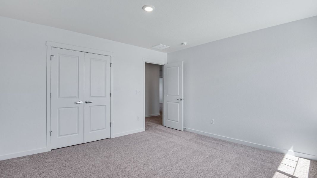 Spacious, unfurnished interior of a new home in Trails at Crowfoot, Parker (Image 42).