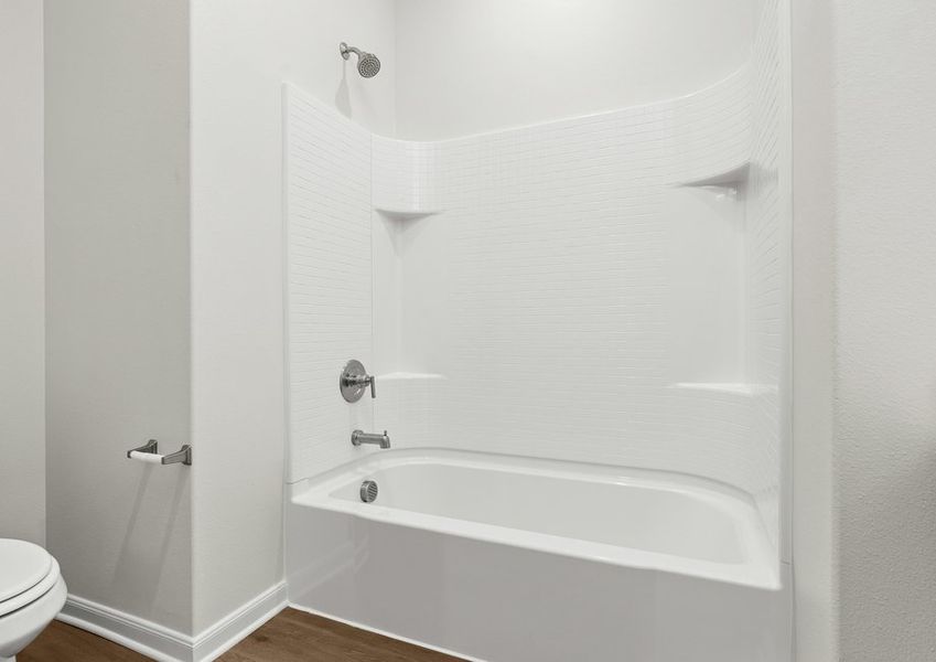 The secondary bathroom has a shower-tub combo. The secondary bathroom has a shower-tub combo.