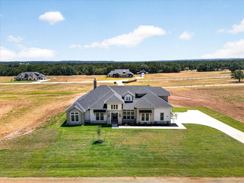 Front exterior of a new home in Brock Heights, Brock, TX, highlighting curb appeal (Image 32).