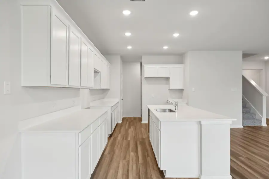 Furnished interior view inside a new home in Saint Tropez, Huffman (Image 9).