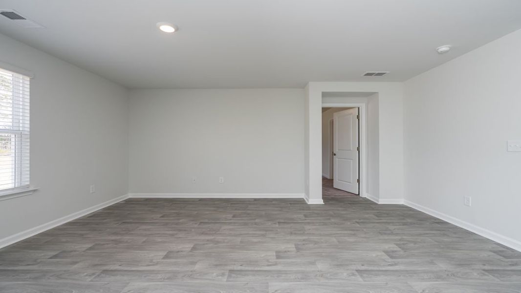 Representative unfurnished interior of a home built from the Cali by D.R. Horton in Jordanville Farms, Galivants Ferry (Image 31).