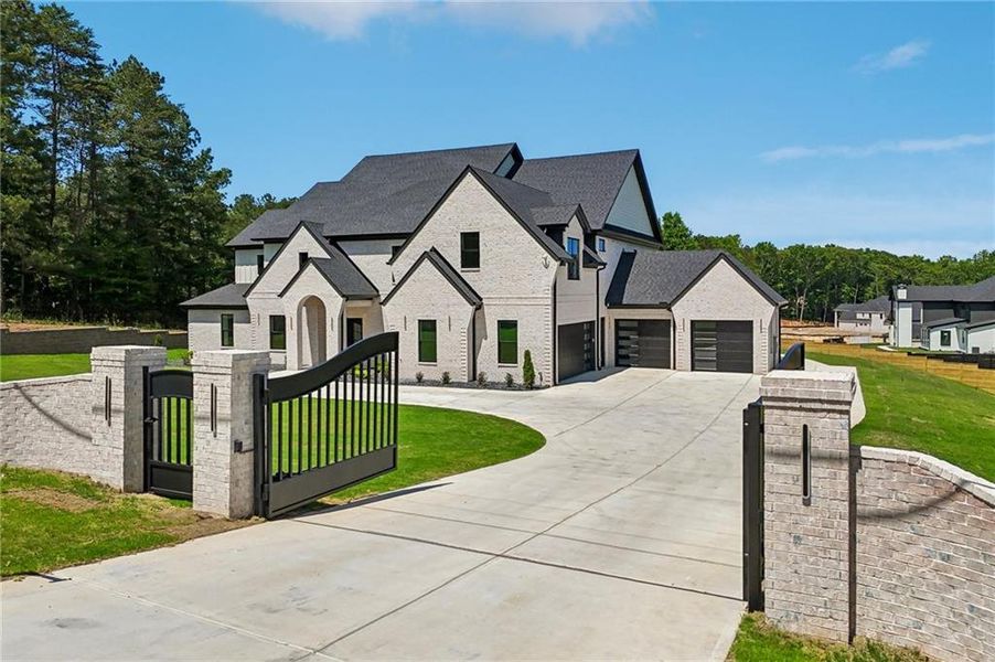 Front exterior of a new home in , Buford, GA, highlighting curb appeal (Image 2). Front exterior of a new home in , Buford, GA, highlighting curb appeal (Image 2).