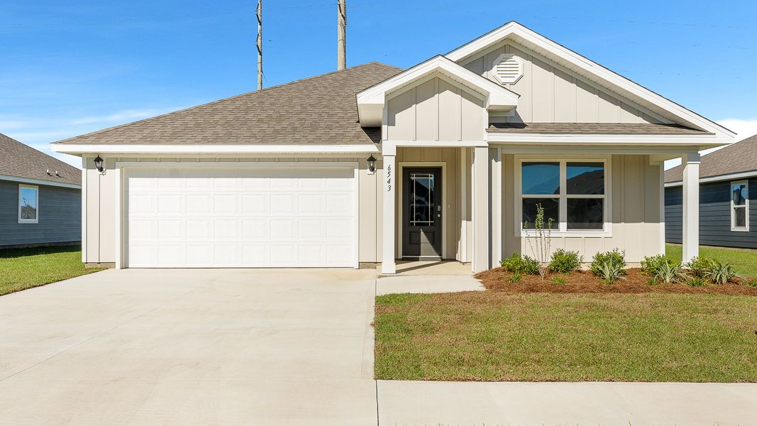 Front exterior of a new home in Liberty, Panama City, FL, highlighting curb appeal (Image 1).