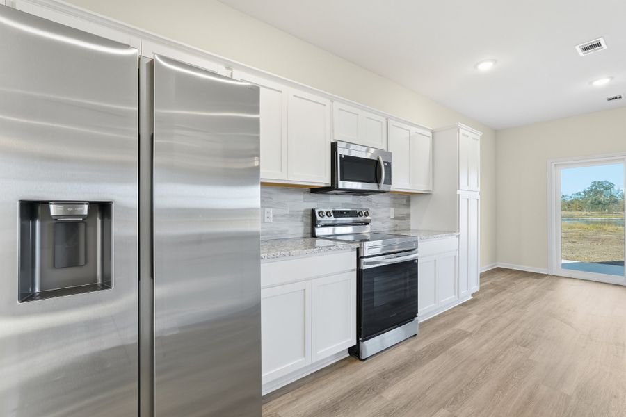 Representative furnished interior of a home built from the The Catherine by RTS Homes in The Village at Sassafras, Allenhurst (Image 7).