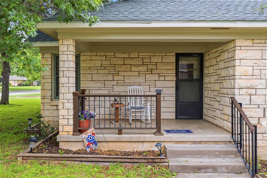 Stone veneer exterior with a covered porch Stone veneer exterior with a covered porch
