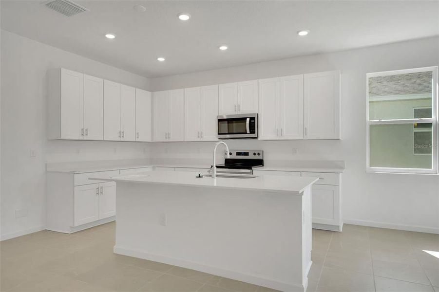 Furnished interior view inside a new home in Willowbrook North, Winter Haven (Image 6).