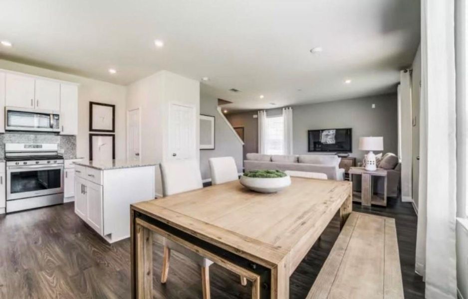 Furnished interior view inside a new home in The Pines At Seven Coves, Conroe (Image 7).