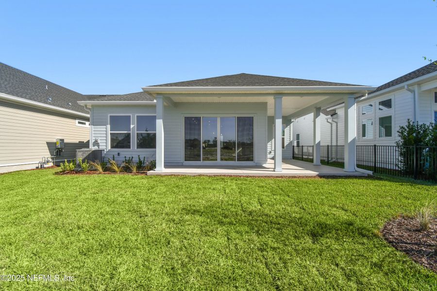 Exterior details and patio area of a home in Seven Pines 50' Front Entry, Jacksonville (Image 2).