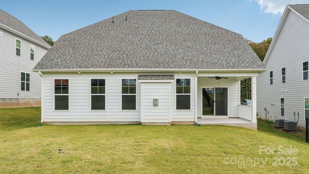 Exterior details and patio area of a home in Falls Cove, Troutman (Image 24).
