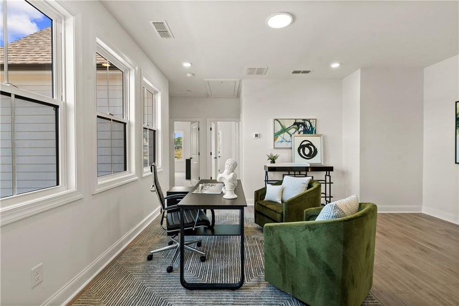 Furnished interior view inside a new home in Promenade at Sawnee Village, Cumming (Image 2). Furnished interior view inside a new home in Promenade at Sawnee Village, Cumming (Image 2).