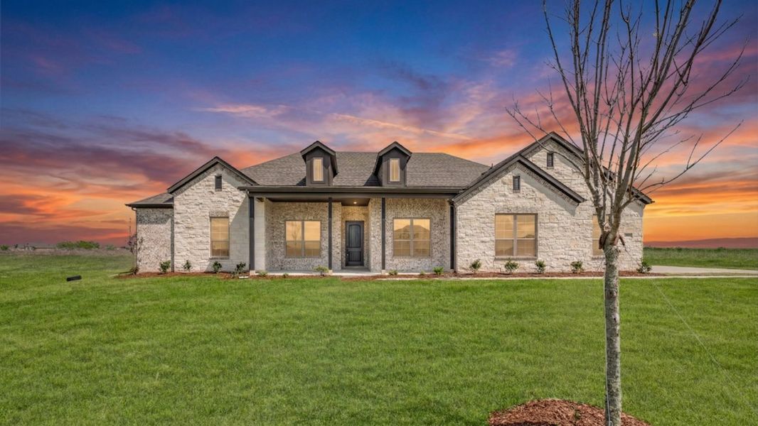 Front exterior of a new home in Berkshire Estates, Mesquite, TX, highlighting curb appeal (Image 2). Front exterior of a new home in Berkshire Estates, Mesquite, TX, highlighting curb appeal (Image 2).