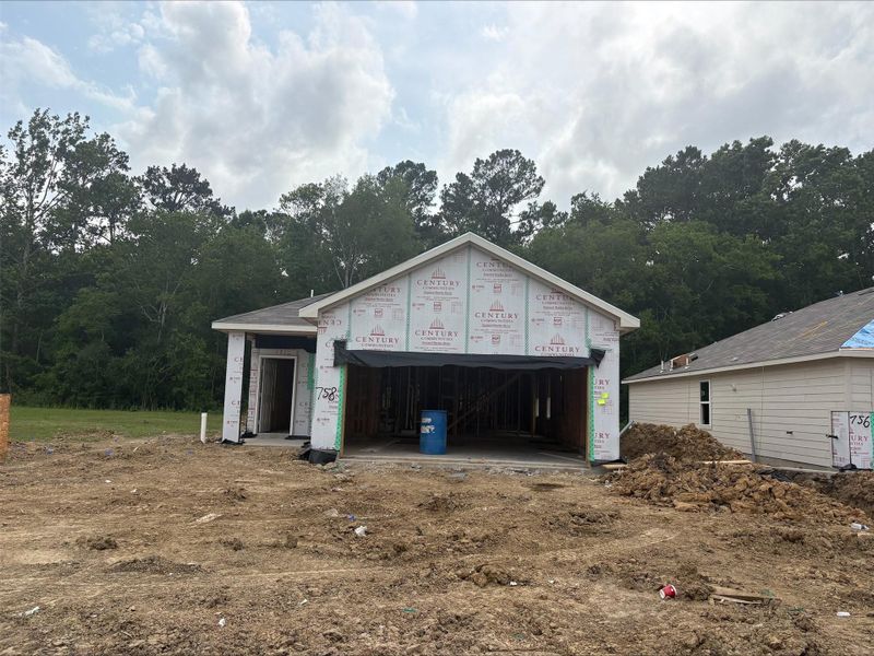 Front exterior of a new home in The Villages at Westpointe, Dayton, TX, highlighting curb appeal (Image 1). Front exterior of a new home in The Villages at Westpointe, Dayton, TX, highlighting curb appeal (Image 1).