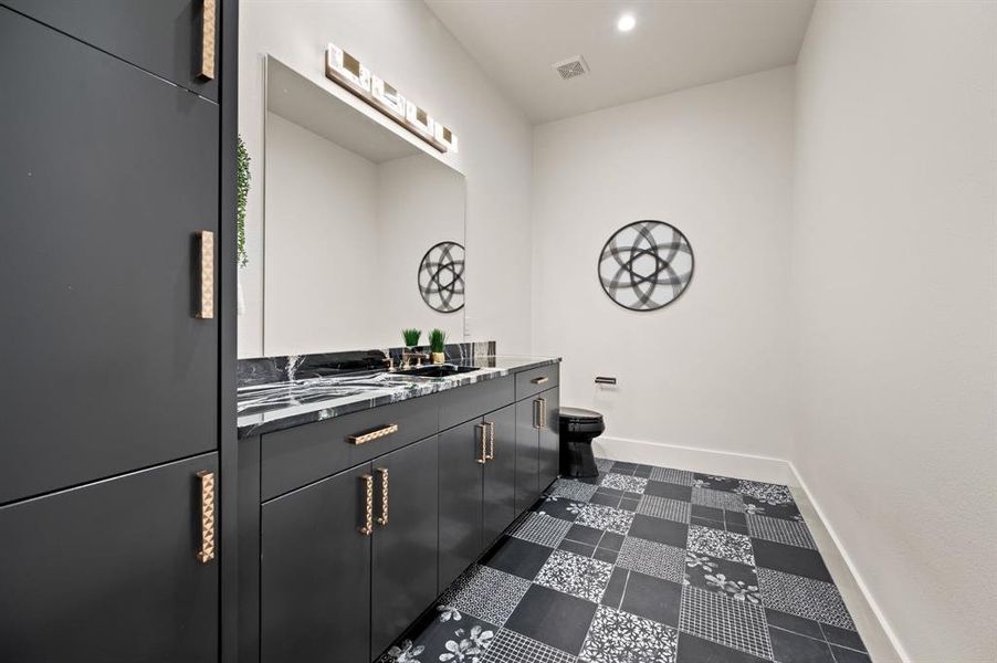 Upstairs Powder Bathroom featuring vanity and toilet