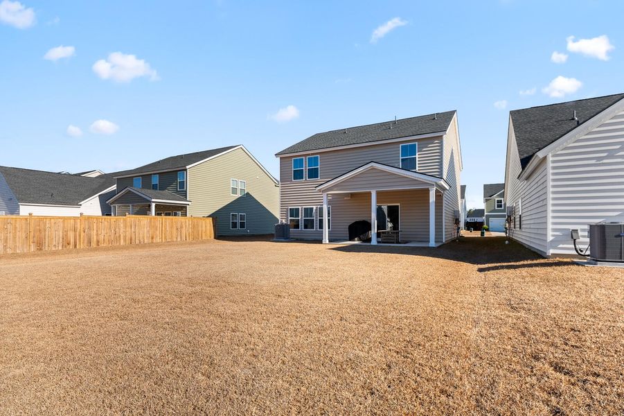 Exterior details and patio area of a home in Heron's Walk at Summers Corner, Summerville (Image 3).