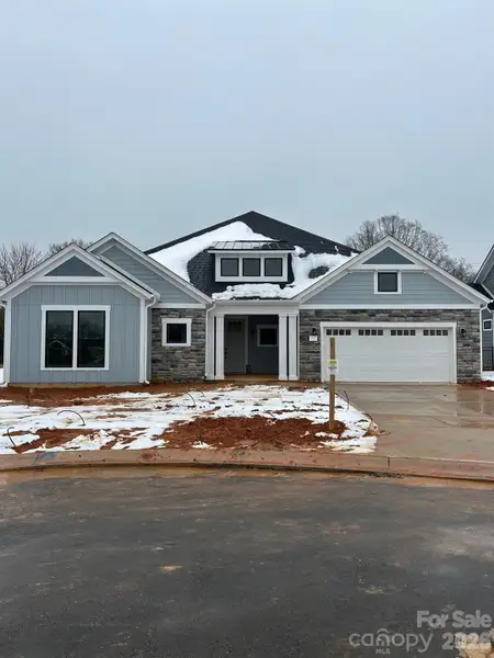 In-progress construction of a new home in The Courtyards at Hodges Farm, Charlotte, NC (Image 7).