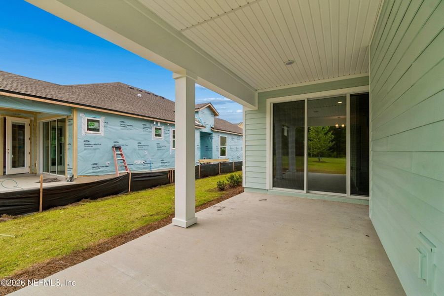 Exterior details and patio area of a home in Westerly Park at Wildlight – Villa Collection, Yulee (Image 3). Exterior details and patio area of a home in Westerly Park at Wildlight – Villa Collection, Yulee (Image 3).