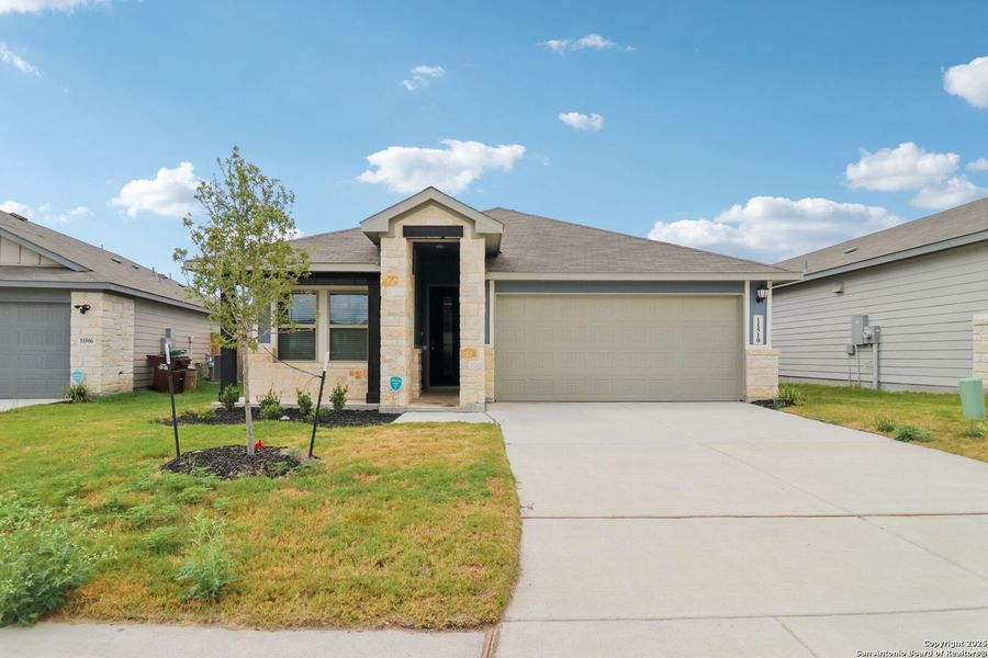 Front exterior of a new home in , San Antonio, TX, highlighting curb appeal (Image 22). Front exterior of a new home in , San Antonio, TX, highlighting curb appeal (Image 22).