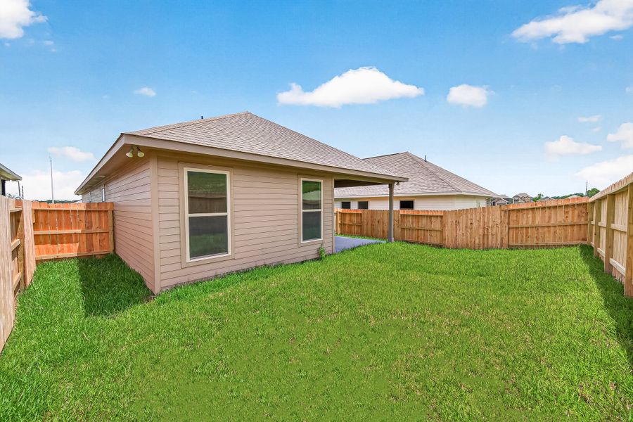 Exterior details and patio area of a home in Mostyn Springs, Magnolia (Image 31).
