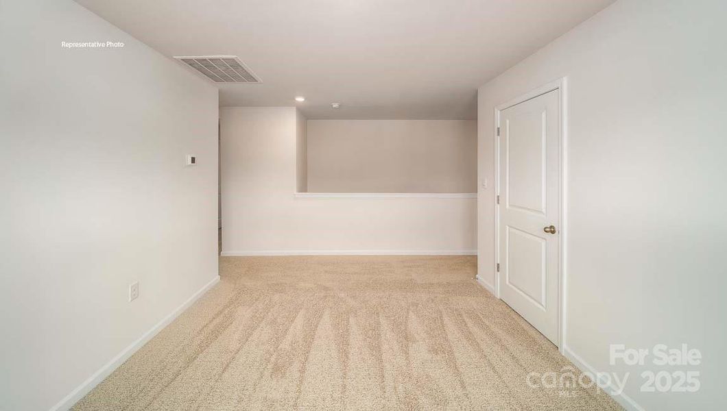 Spacious, unfurnished interior of a new home in Wallace Springs, Statesville (Image 11).