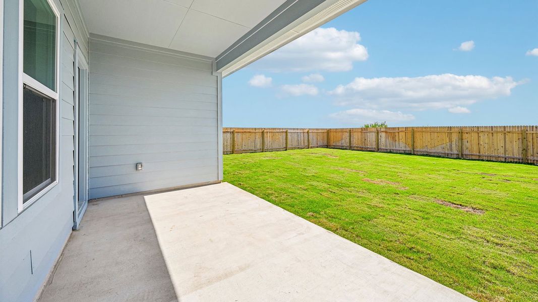 Exterior details and patio area of a home in Carillon, Manor (Image 4).