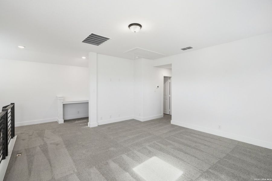 Spacious, unfurnished interior of a new home in Prominence, San Antonio (Image 33).