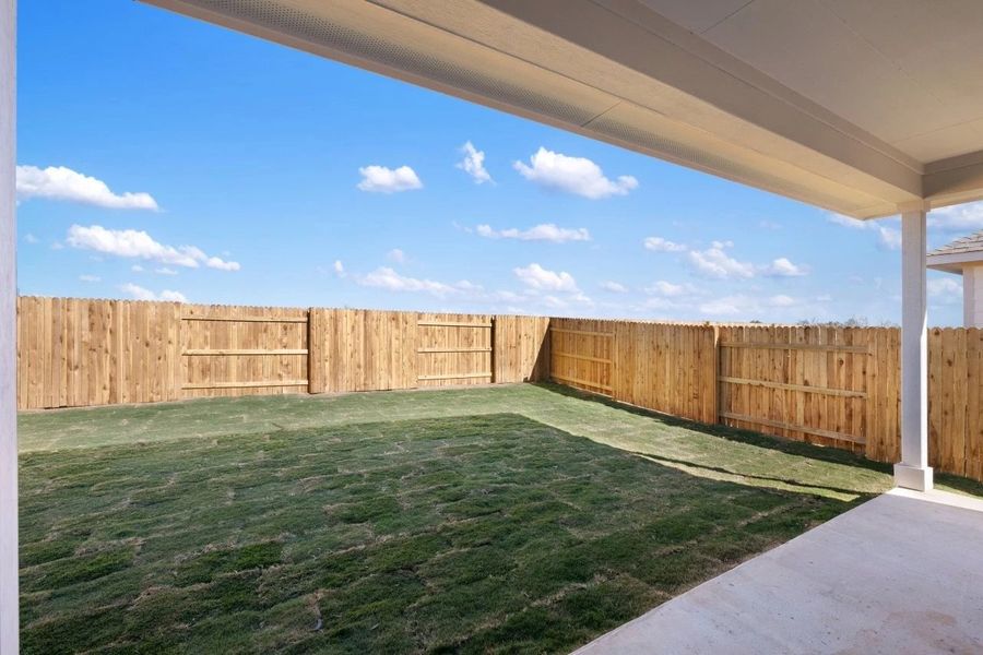 Exterior details and patio area of a home in Patterson Ranch, Georgetown (Image 25).