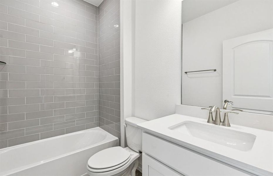 Upgraded secondary bath with elegant finishes Upgraded secondary bath with elegant finishes