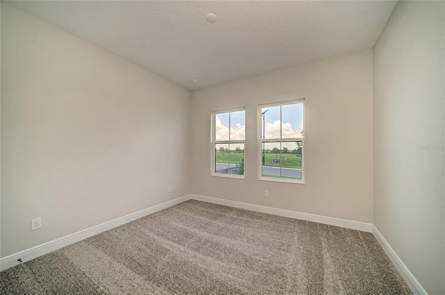 Spacious, unfurnished interior of a new home in Pasadena Ridge, Dade City (Image 27).
