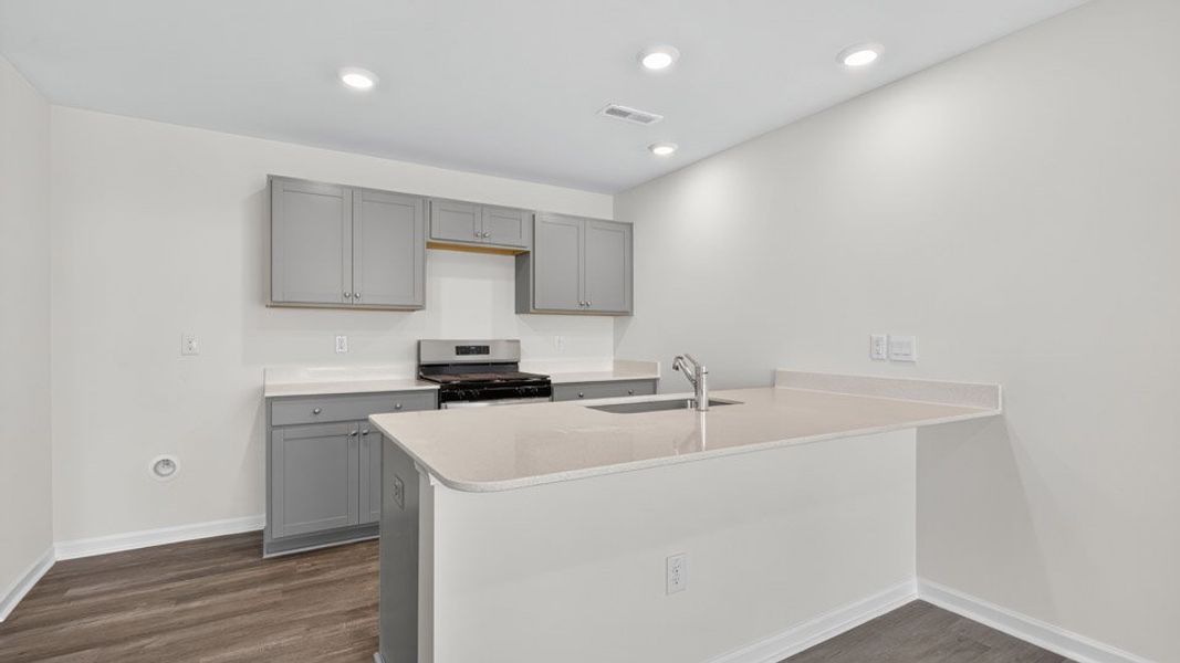 Furnished interior view inside a new home in The Townes at Honeycutt Oaks, Angier (Image 6).