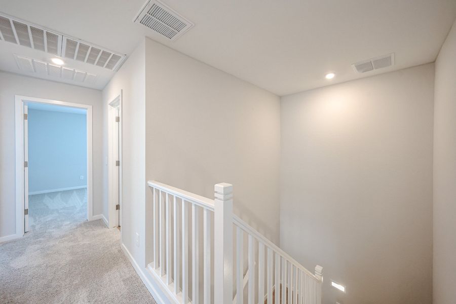 A white staircase in a house.